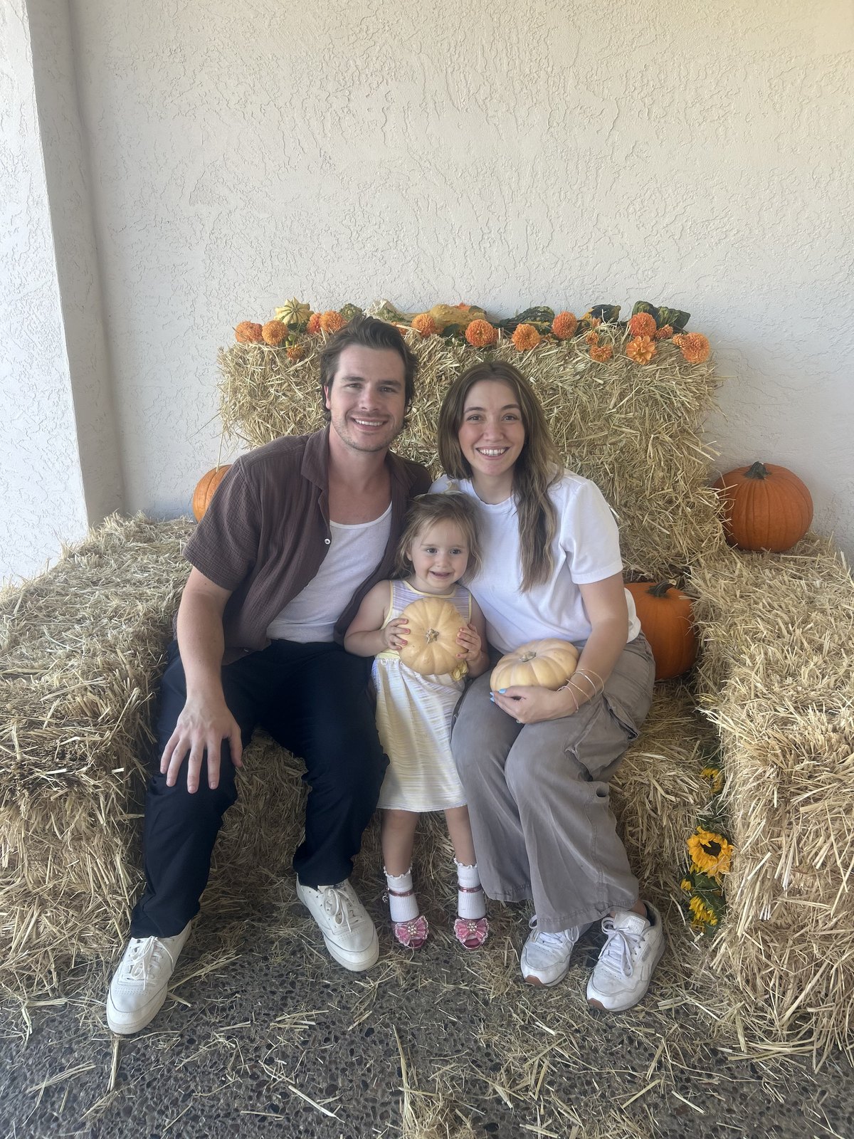 Dakota Yates with his wife and daughter